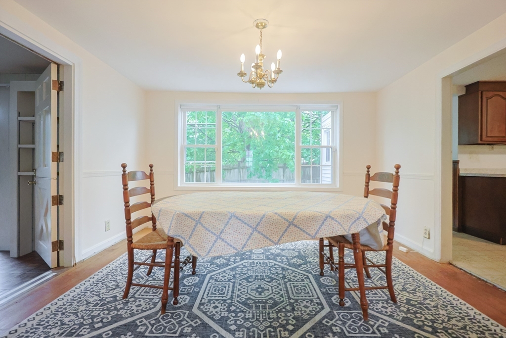 17 Sagamore Road Belmont, MA 02478 - Photo 9 of 35 a view of a dining room with furniture window and wooden floor