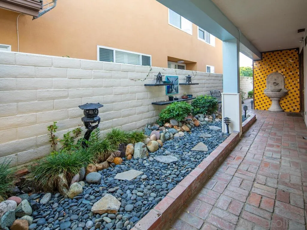 51 Green Turtle Road Coronado, CA 92118 - Photo 5 of 46 a house view with a outdoor space