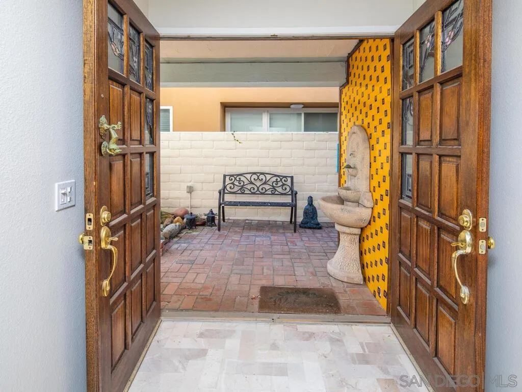 51 Green Turtle Road Coronado, CA 92118 - Photo 7 of 46 a view of front door of house