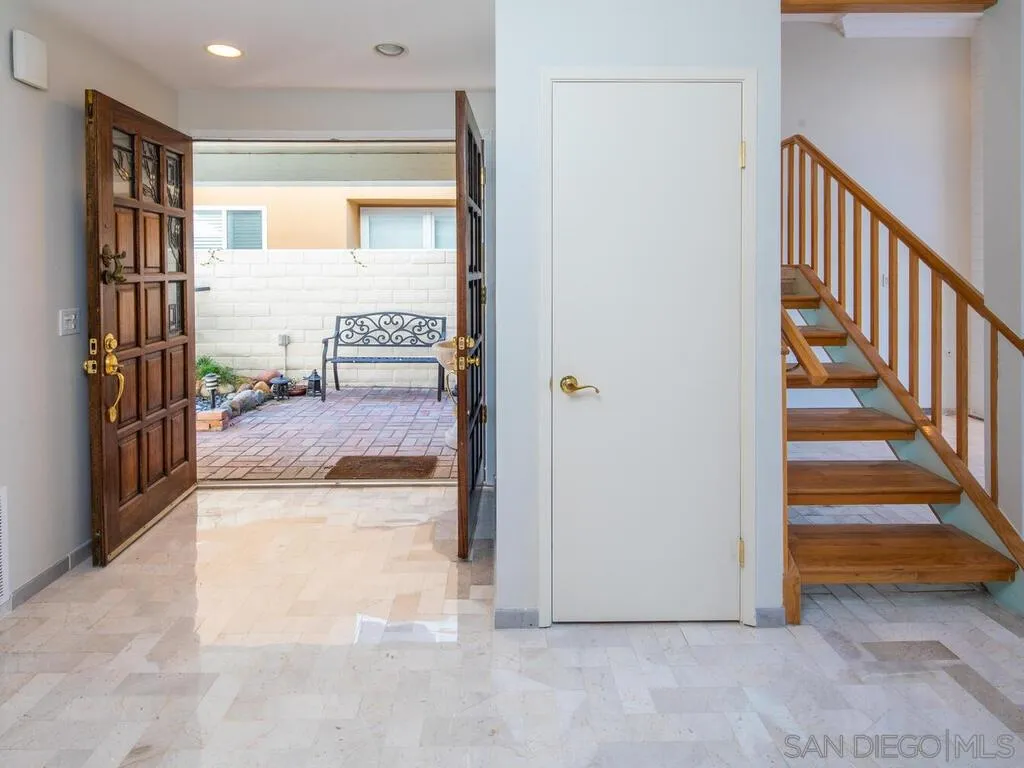 51 Green Turtle Road Coronado, CA 92118 - Photo 8 of 46 a view of a hallway view with staircase