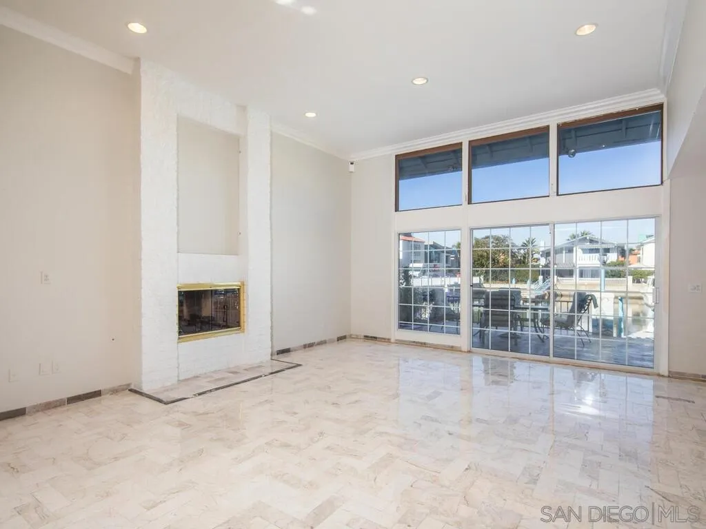 51 Green Turtle Road Coronado, CA 92118 - Photo 10 of 46 a view of an empty room with a fireplace