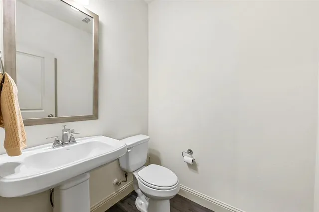 a bathroom with a sink and a toilet