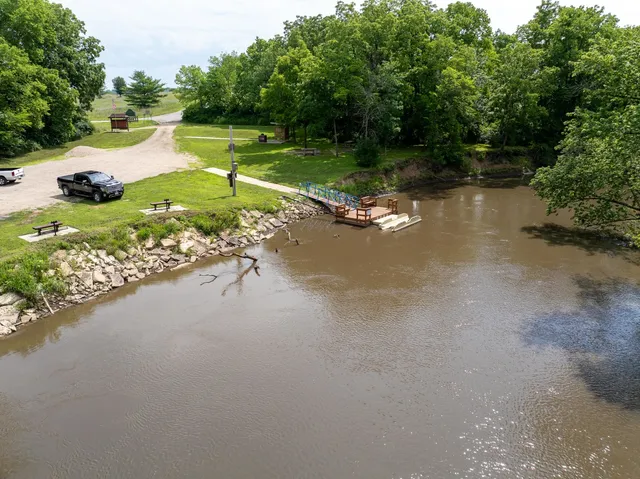 a view of a lake with a yard