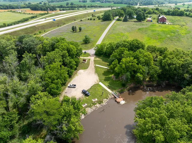a view of a garden with a swimming pool