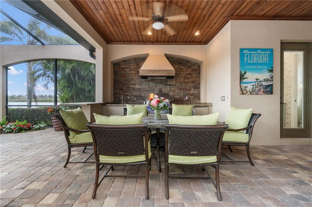 3440 Runaway Lane Naples, FL 34114 - Photo 30 of 42 View of patio / terrace featuring a ceiling fan and outdoor dining space