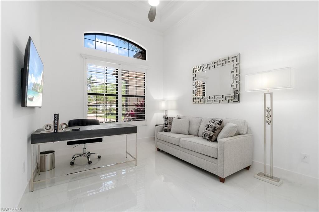 3440 Runaway Lane Naples, FL 34114 - Photo 6 of 42 Tiled office space featuring crown molding and ceiling fan