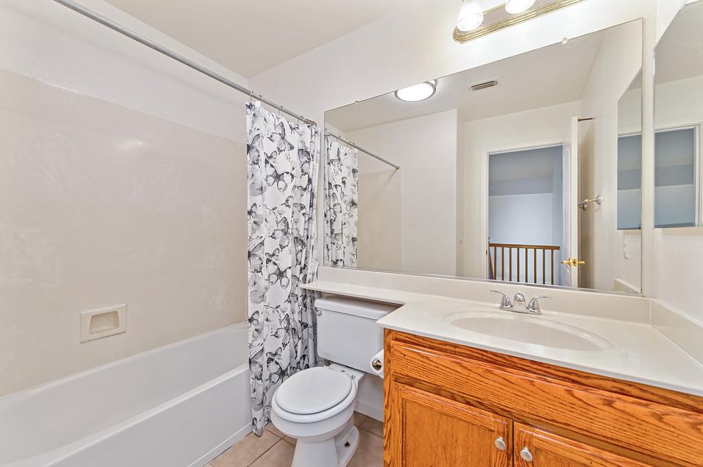 3524 Riojo Way Rancho Cordova, CA 95670 - Photo 30 of 47 a bathroom with a sink a toilet and a bathtub