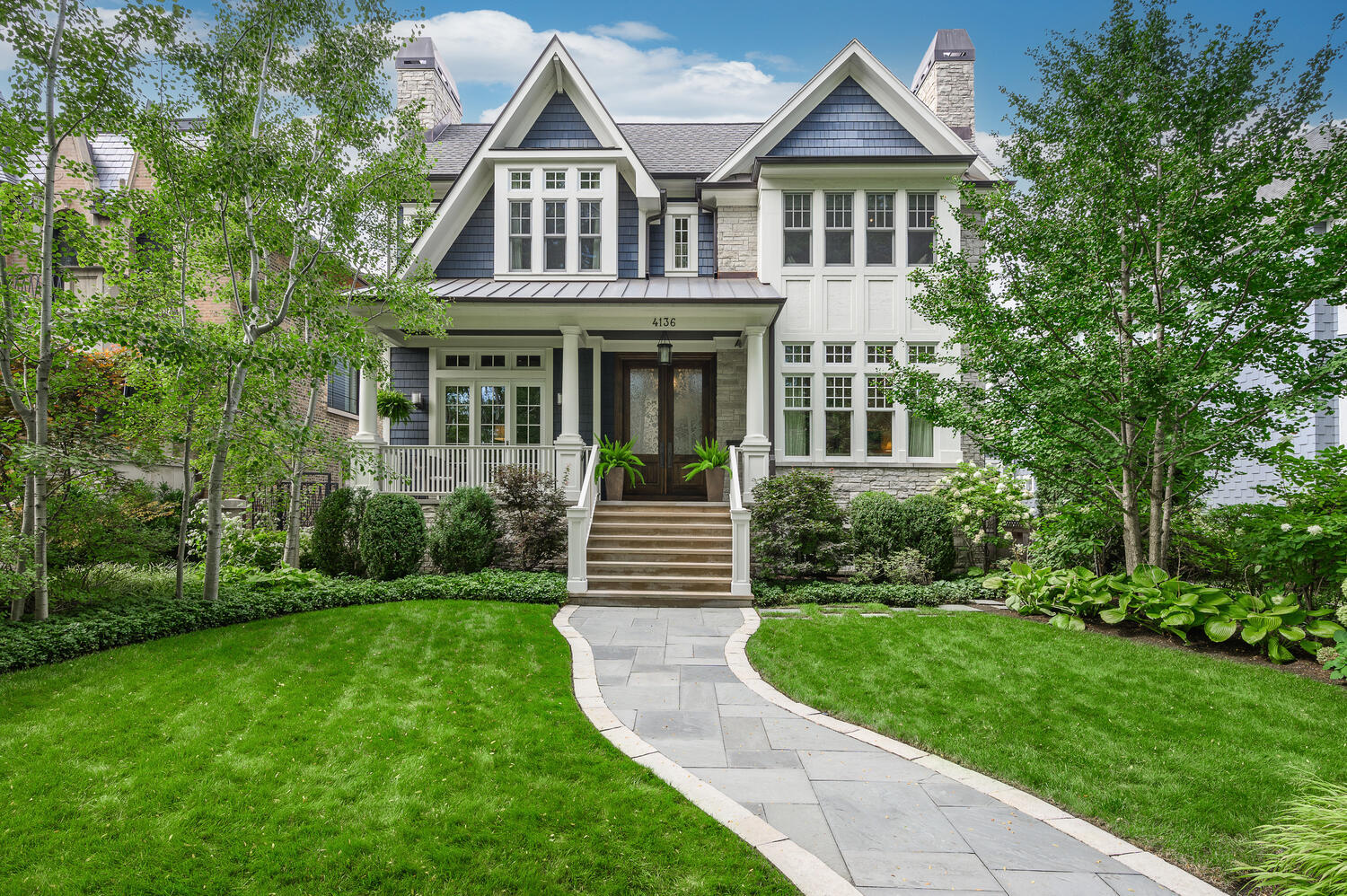 4136 North Greenview Avenue Chicago, IL 60613 - Photo 1 of 56 a front view of a house with a yard