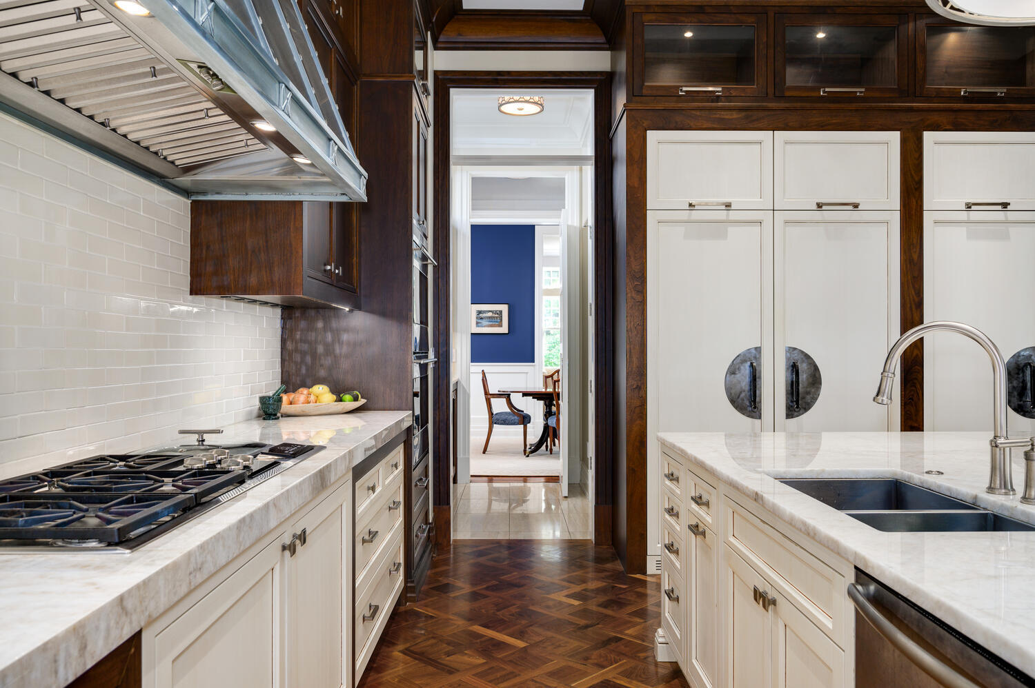 4136 North Greenview Avenue Chicago, IL 60613 - Photo 12 of 56 a kitchen with a sink and a stove top oven