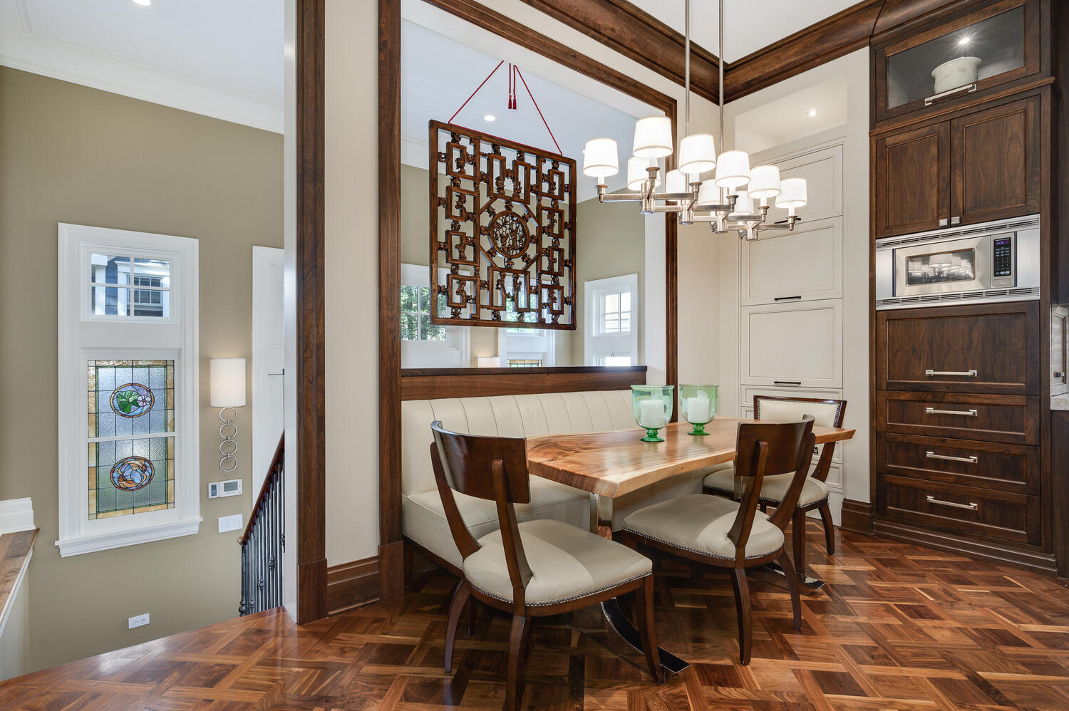 4136 North Greenview Avenue Chicago, IL 60613 - Photo 15 of 56 a view of a dining room with furniture and chandelier