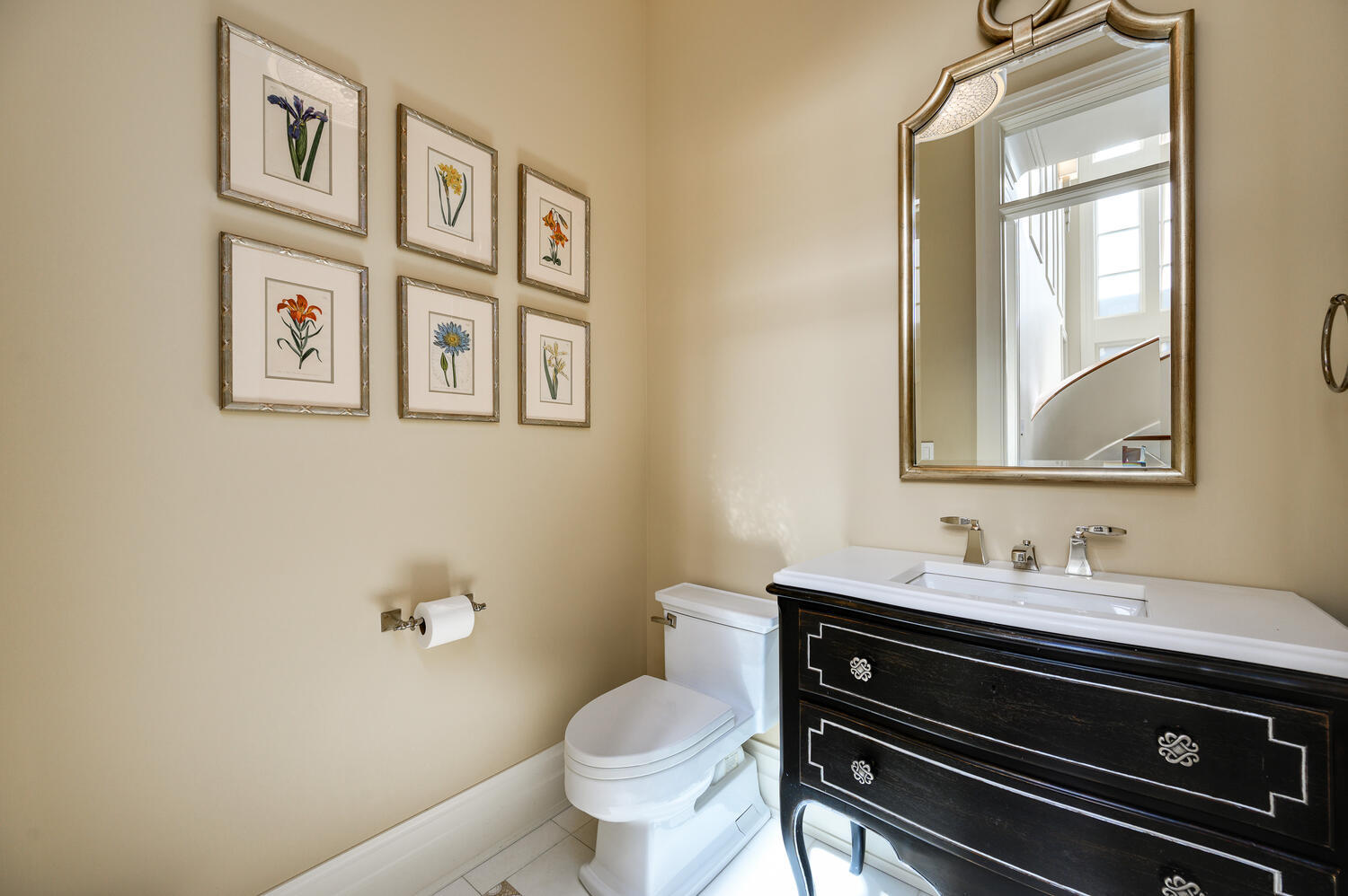 4136 North Greenview Avenue Chicago, IL 60613 - Photo 20 of 56 a bathroom with a toilet sink and mirror