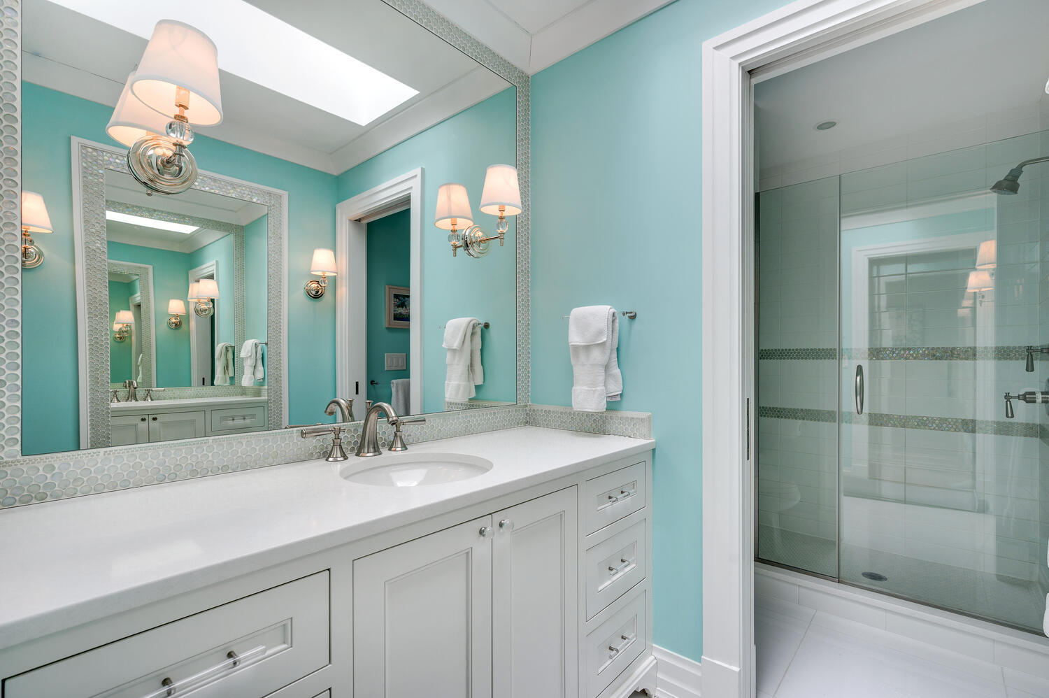 4136 North Greenview Avenue Chicago, IL 60613 - Photo 31 of 56 a bathroom with a sink a vanity and a mirror