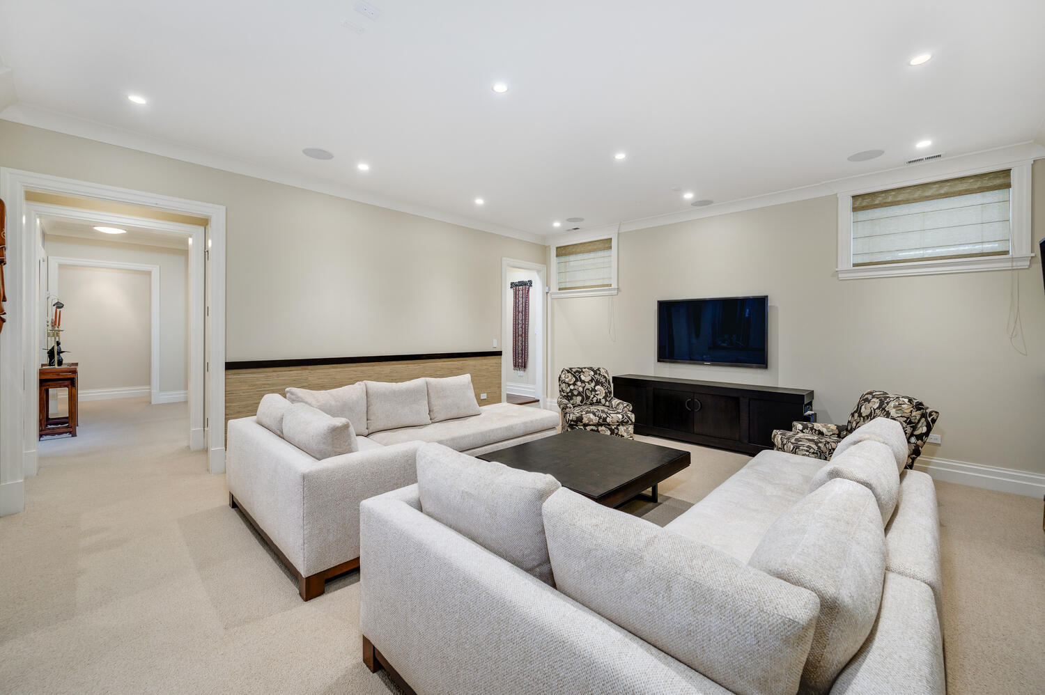 4136 North Greenview Avenue Chicago, IL 60613 - Photo 35 of 56 a living room with furniture and a flat screen tv