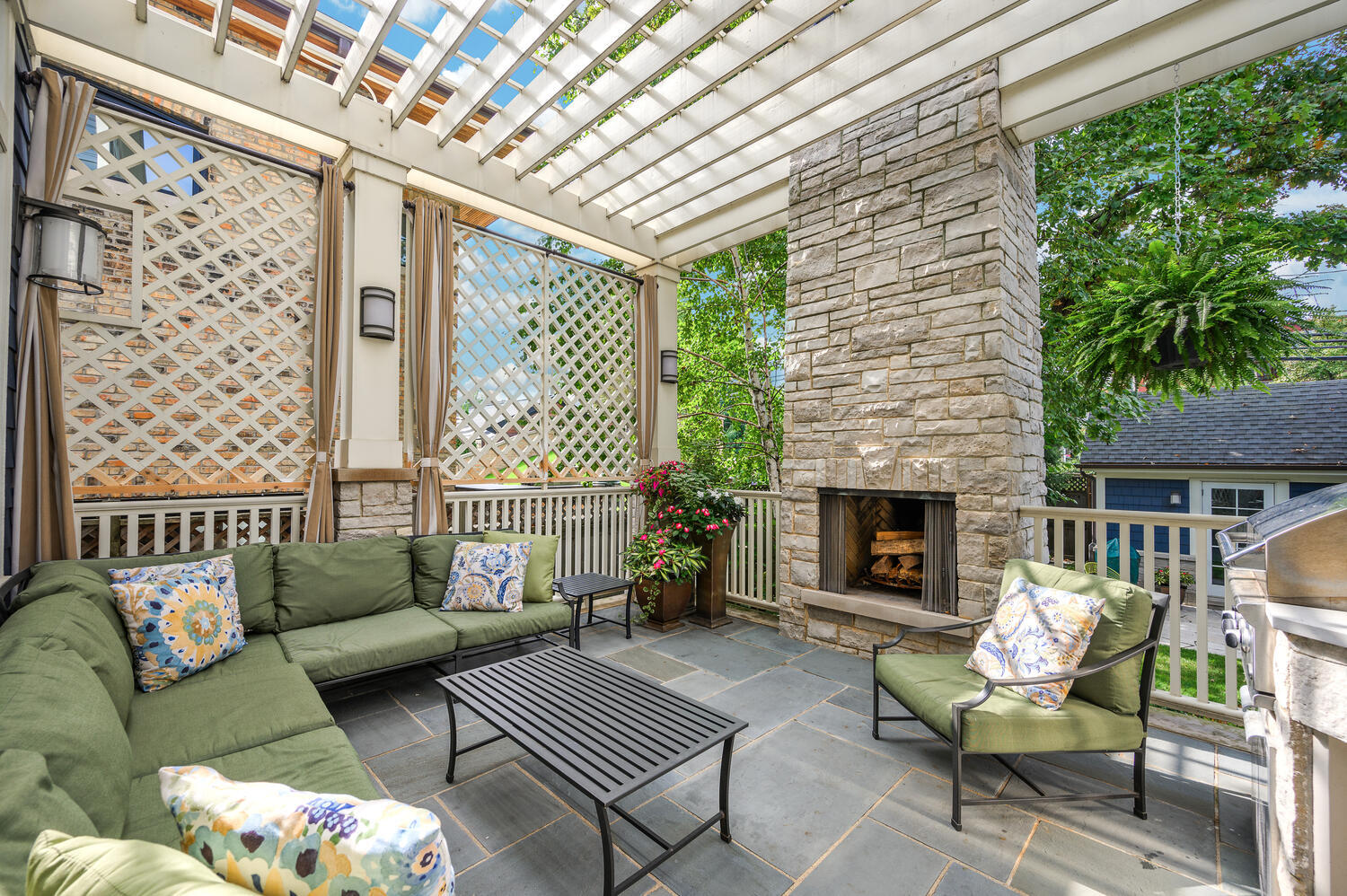 4136 North Greenview Avenue Chicago, IL 60613 - Photo 47 of 56 a balcony with furniture and a fireplace