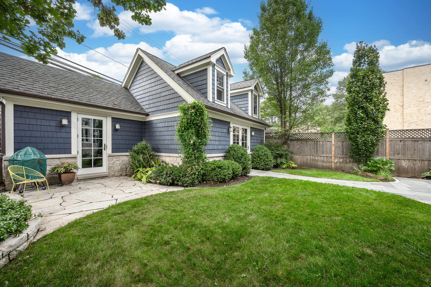 4136 North Greenview Avenue Chicago, IL 60613 - Photo 51 of 56 a view of a house with a patio