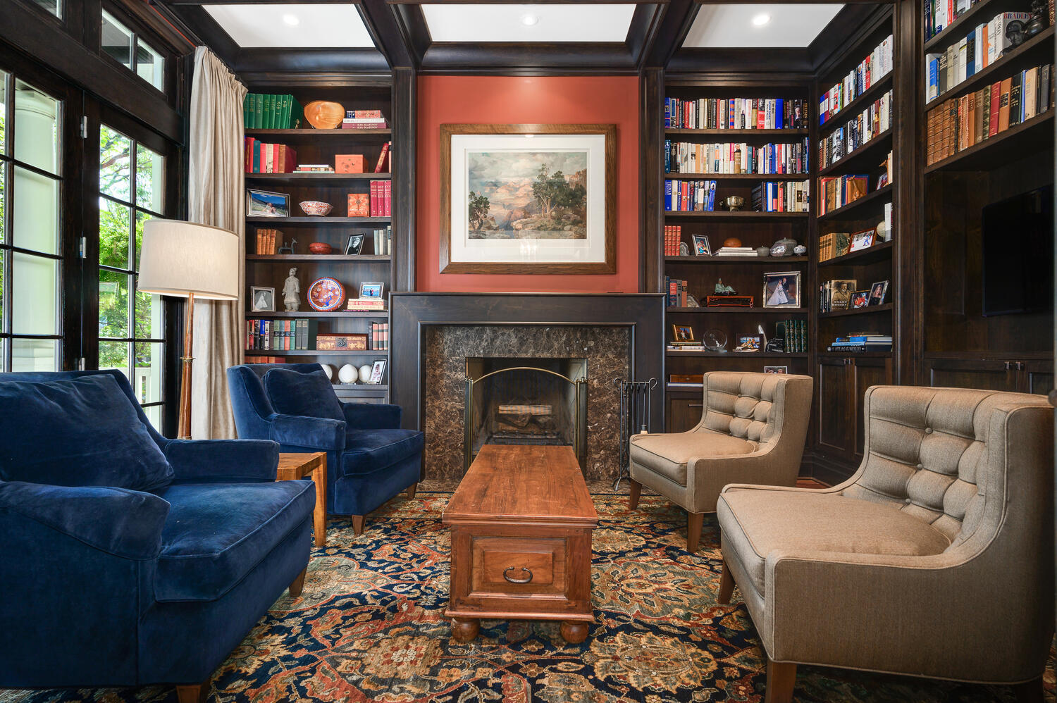 4136 North Greenview Avenue Chicago, IL 60613 - Photo 7 of 56 a living room with furniture a bookshelf and a fireplace