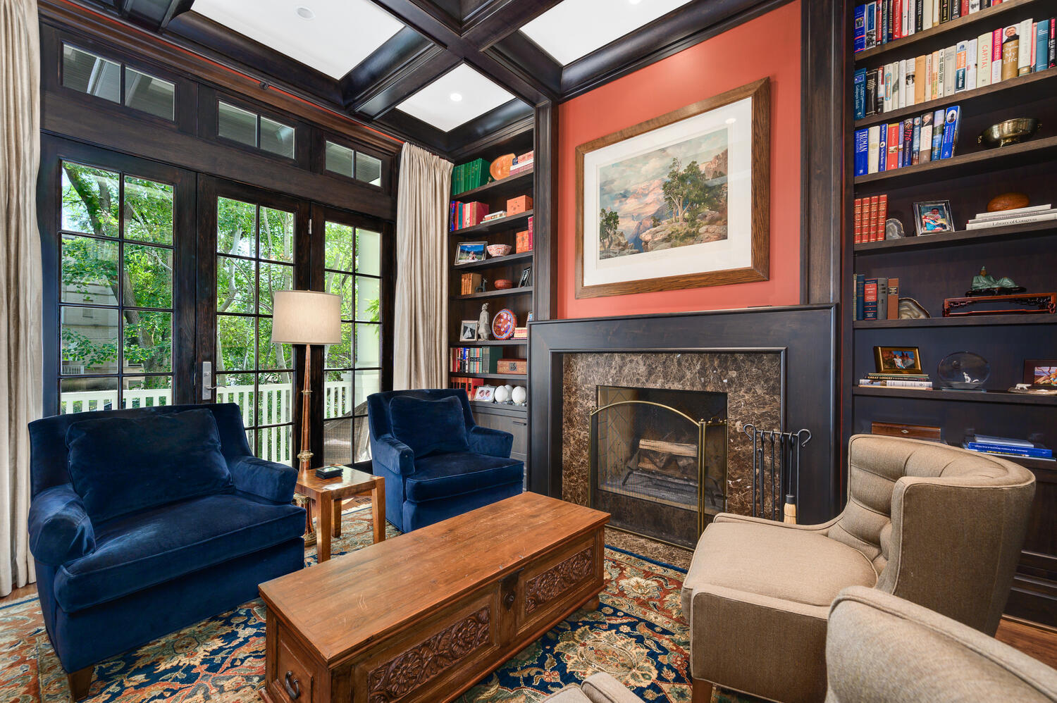 4136 North Greenview Avenue Chicago, IL 60613 - Photo 8 of 56 a living room with furniture a bookshelf and a fireplace