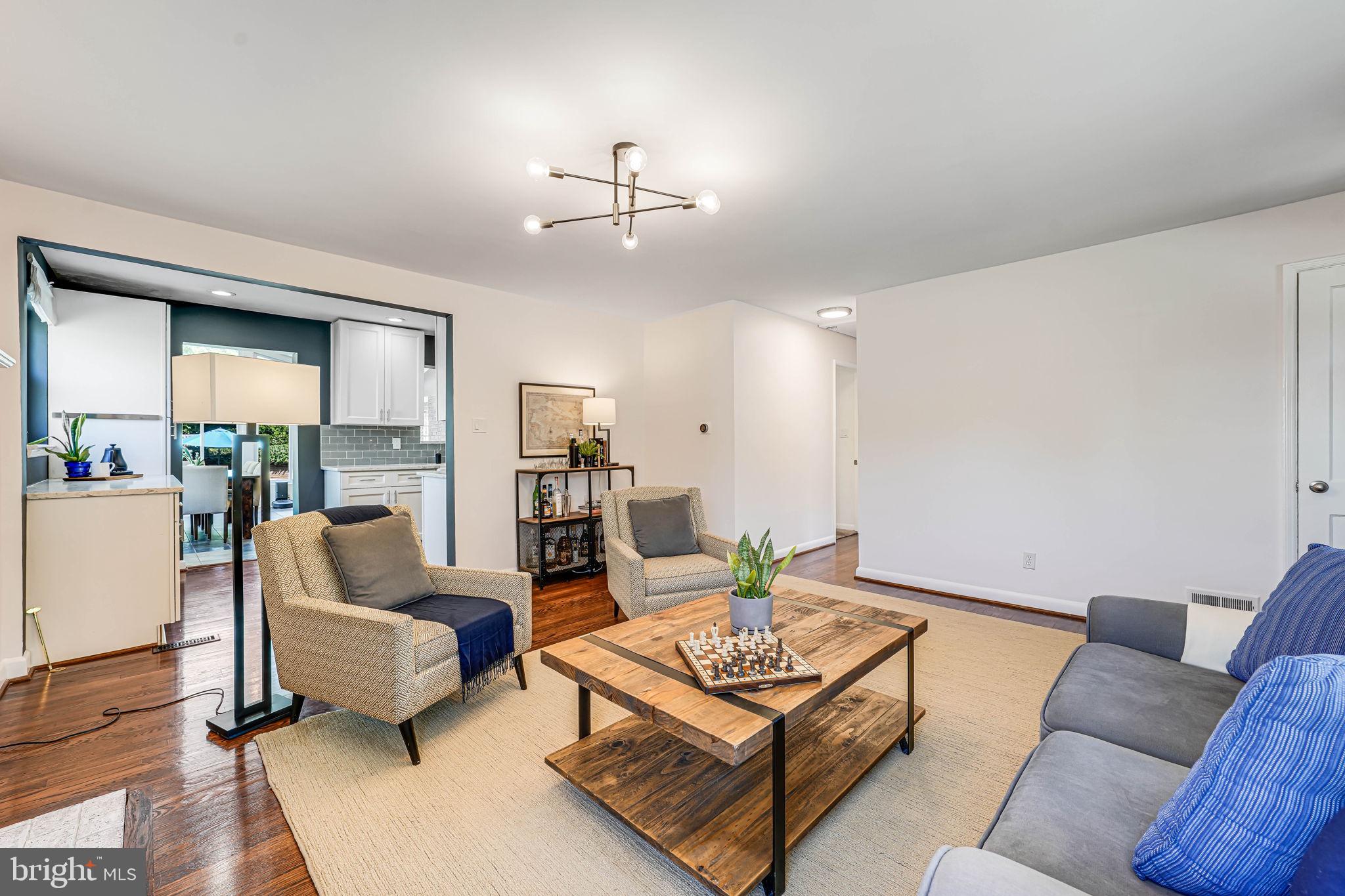 7306 Wayne Drive Annandale, VA 22003 - Photo 2 of 42 Living Room leads to kitchen and family room