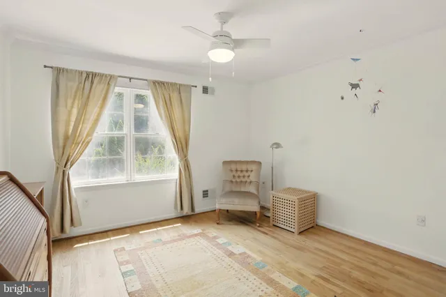 a view of livingroom with furniture and windows