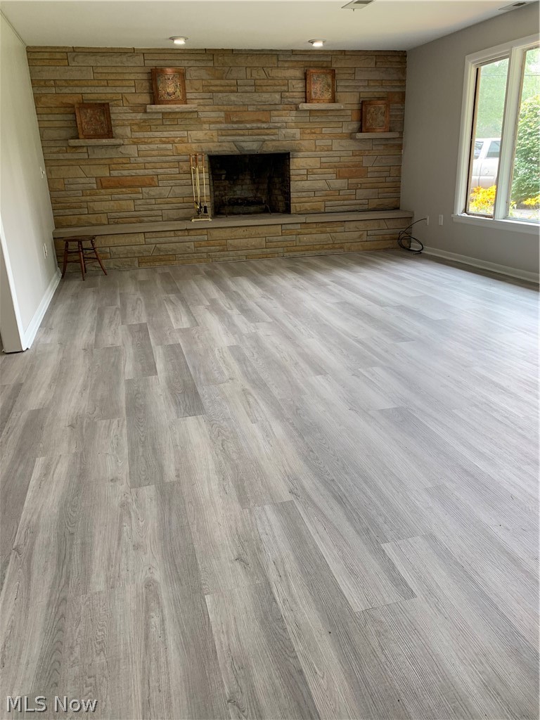 7595 Hopkins Road Mentor, OH 44060 - Photo 3 of 30 Huge living room with new luxury vinyl flooring
