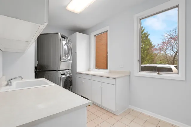 a bedroom with furniture and wooden floor