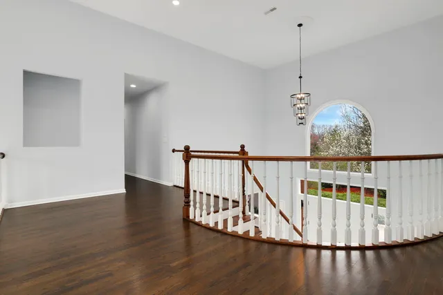 a room with furniture and a wooden floor