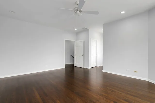 a bathroom with a granite countertop sink double and mirror