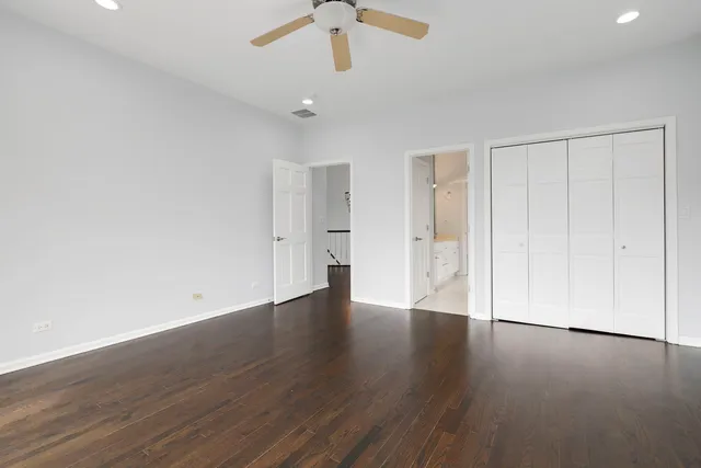 a living room with furniture a pool table and a fireplace
