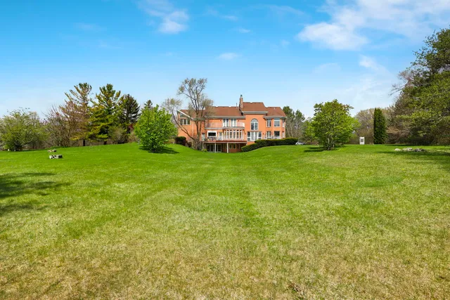 an aerial view of a house with a garden