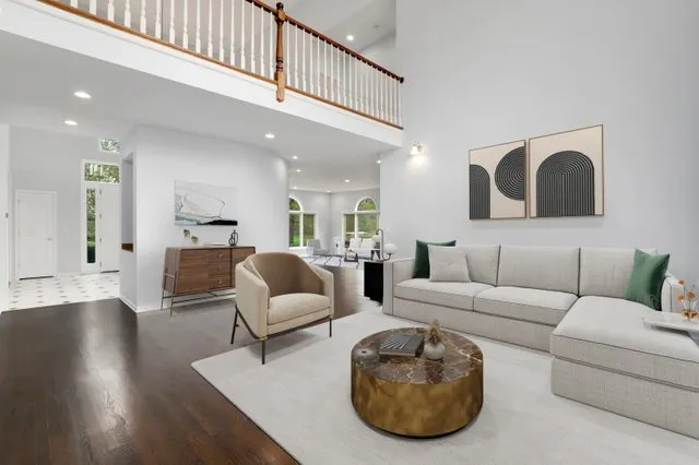 a view of an entryway with wooden floor