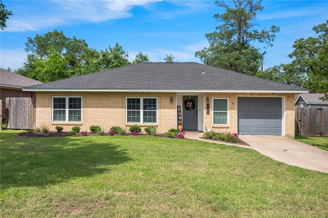 front view of a house and a yard