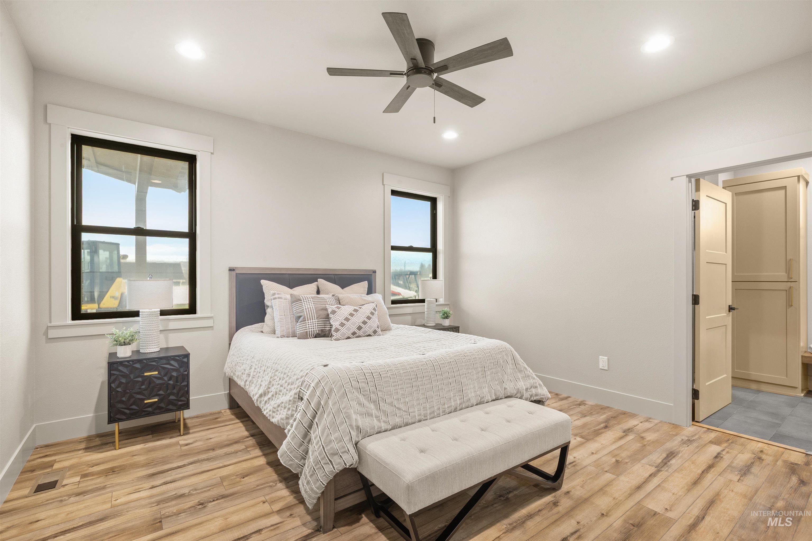 335 Warner Avenue Lewiston, ID 83501 - Photo 23 of 43 Bedroom featuring light wood finished floors, ceiling fan, and recessed lighting