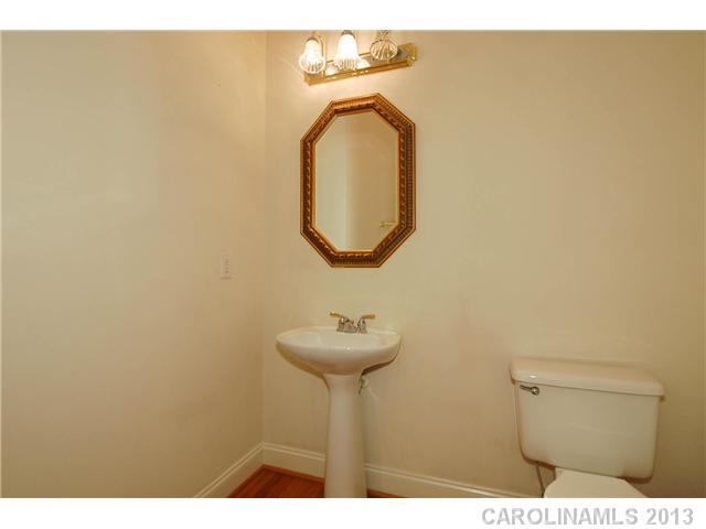 137 Sardis Pointe Road Matthews, NC 28105 - Photo 11 of 16 a bathroom with a sink and a mirror
