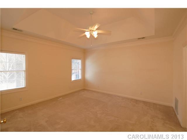 137 Sardis Pointe Road Matthews, NC 28105 - Photo 12 of 16 a view of an empty room with a window