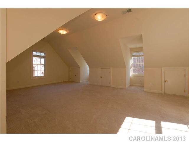137 Sardis Pointe Road Matthews, NC 28105 - Photo 15 of 16 a view of an empty room with windows