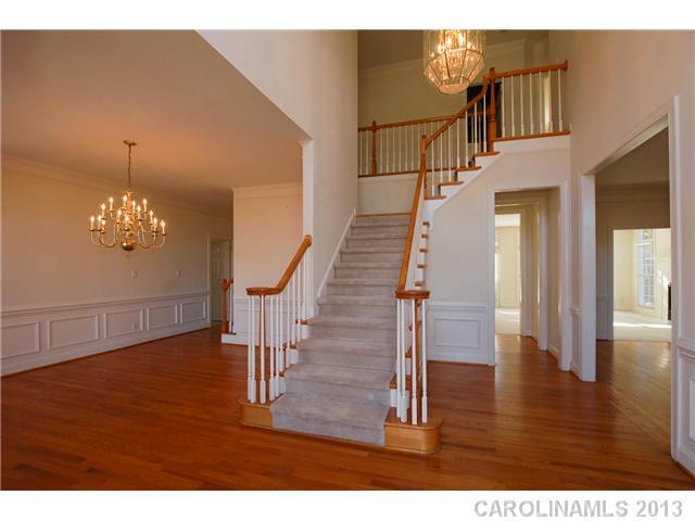 137 Sardis Pointe Road Matthews, NC 28105 - Photo 3 of 16 a view of entryway and hall with wooden floor