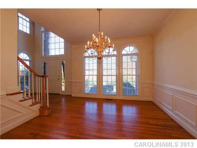 137 Sardis Pointe Road Matthews, NC 28105 - Photo 5 of 16 a view of entryway with wooden floor