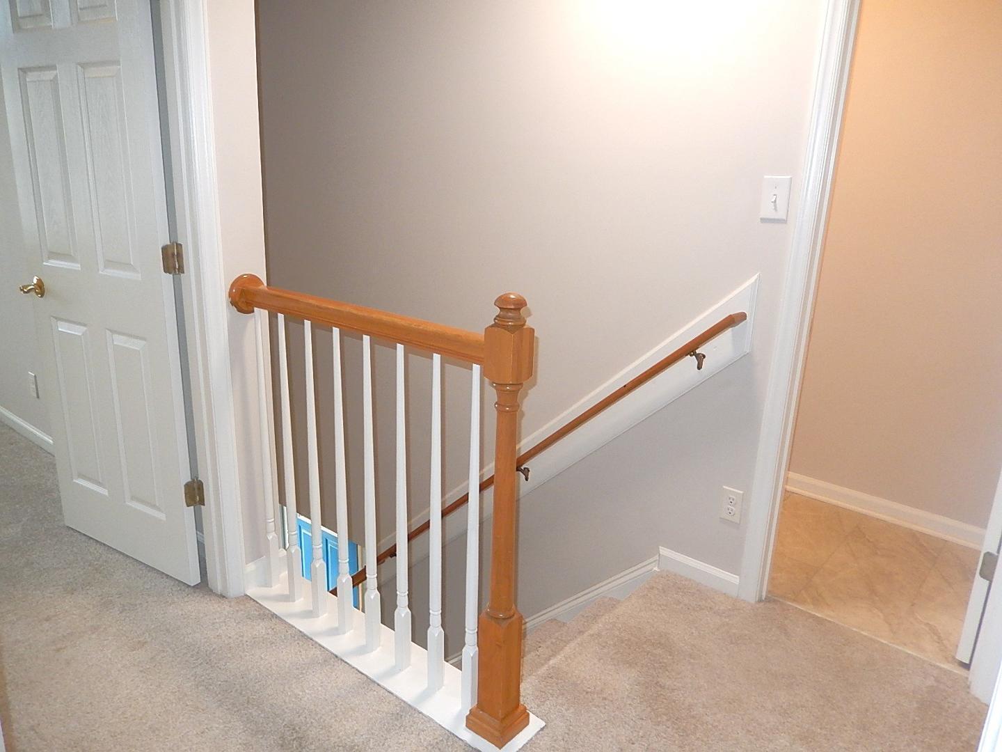 211 Bridgepath Drive Cary, NC 27513 - Photo 14 of 26 a view of a hallway with staircase