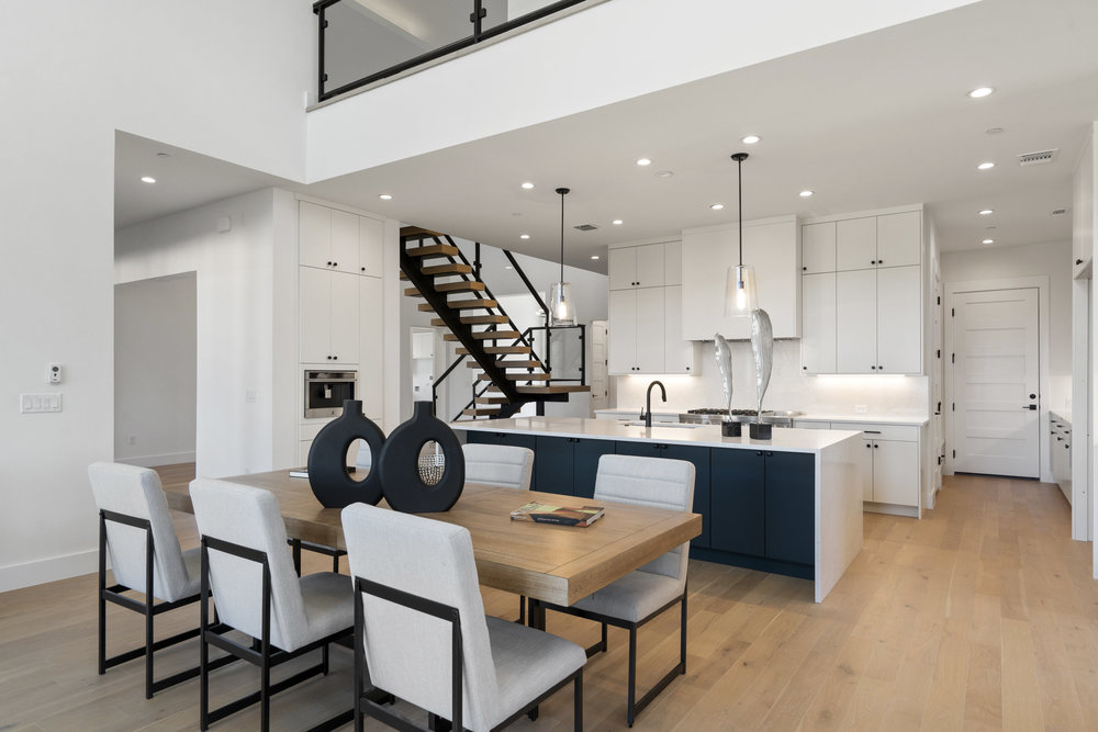 6101 Adhara Pass Austin, TX 78730 - Photo 14 of 40 a kitchen with a dining table chairs and view of living room