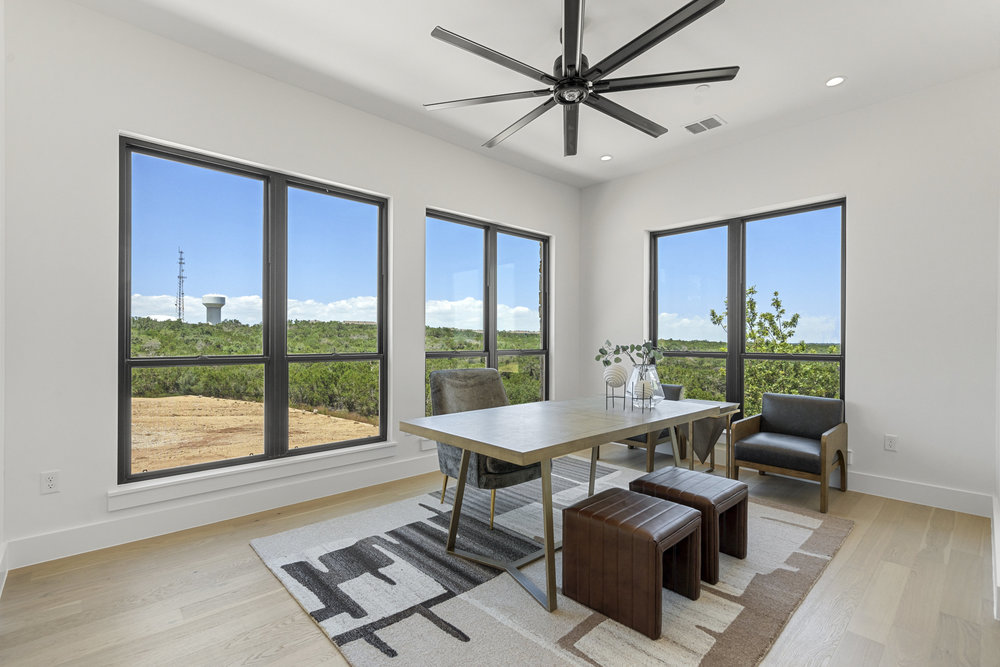 6101 Adhara Pass Austin, TX 78730 - Photo 20 of 40 a living room with furniture and a window