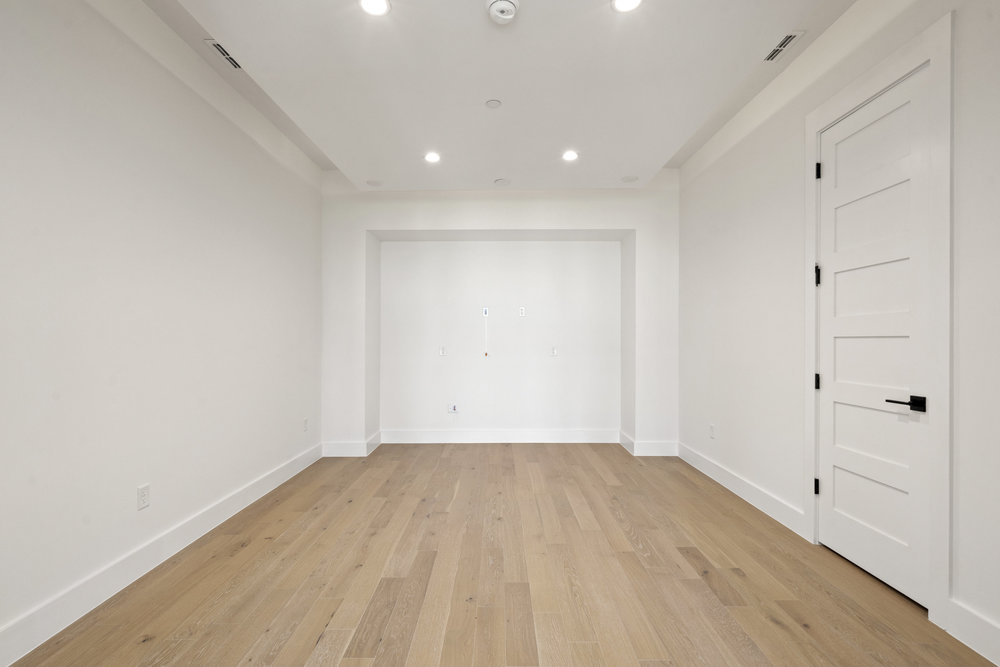 6101 Adhara Pass Austin, TX 78730 - Photo 27 of 40 a view of room with window and wooden floor