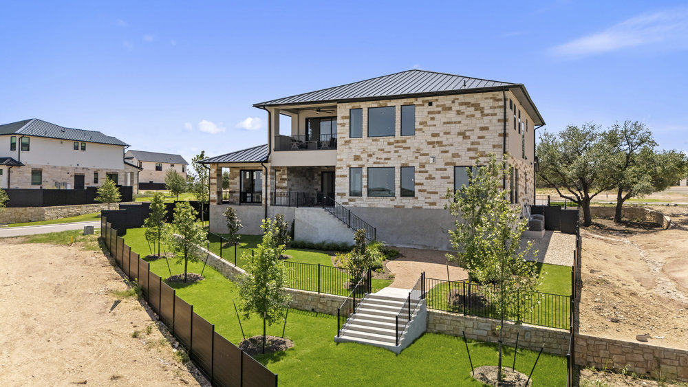 6101 Adhara Pass Austin, TX 78730 - Photo 34 of 40 a view of a house with backyard porch and sitting area