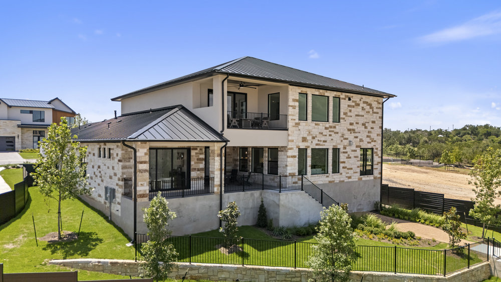 6101 Adhara Pass Austin, TX 78730 - Photo 35 of 40 front view of house with a yard
