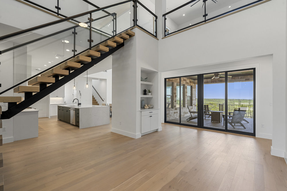 6101 Adhara Pass Austin, TX 78730 - Photo 8 of 40 a view of entryway and hall with wooden floor
