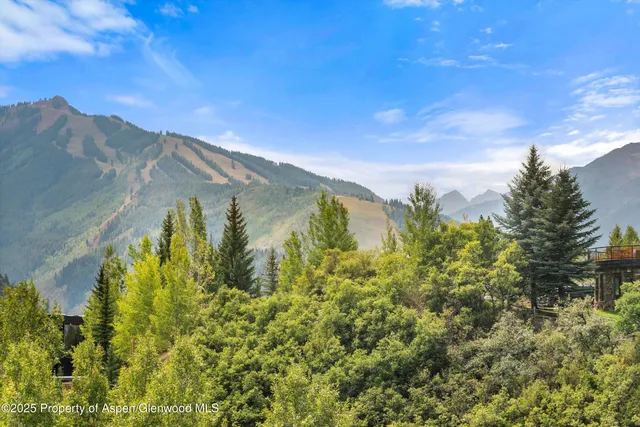 an outdoor view of house with outdoor seating