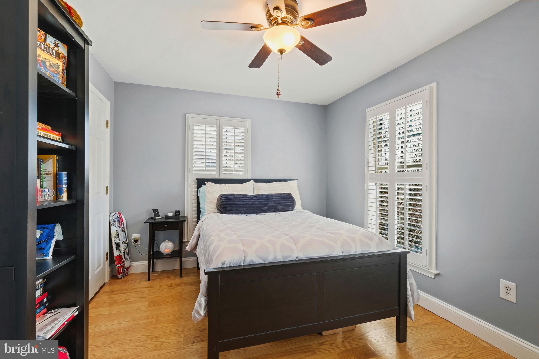 220 Thaxton Street Gaithersburg, MD 20878 - Photo 21 of 61 a bedroom with a bed and a chandelier
