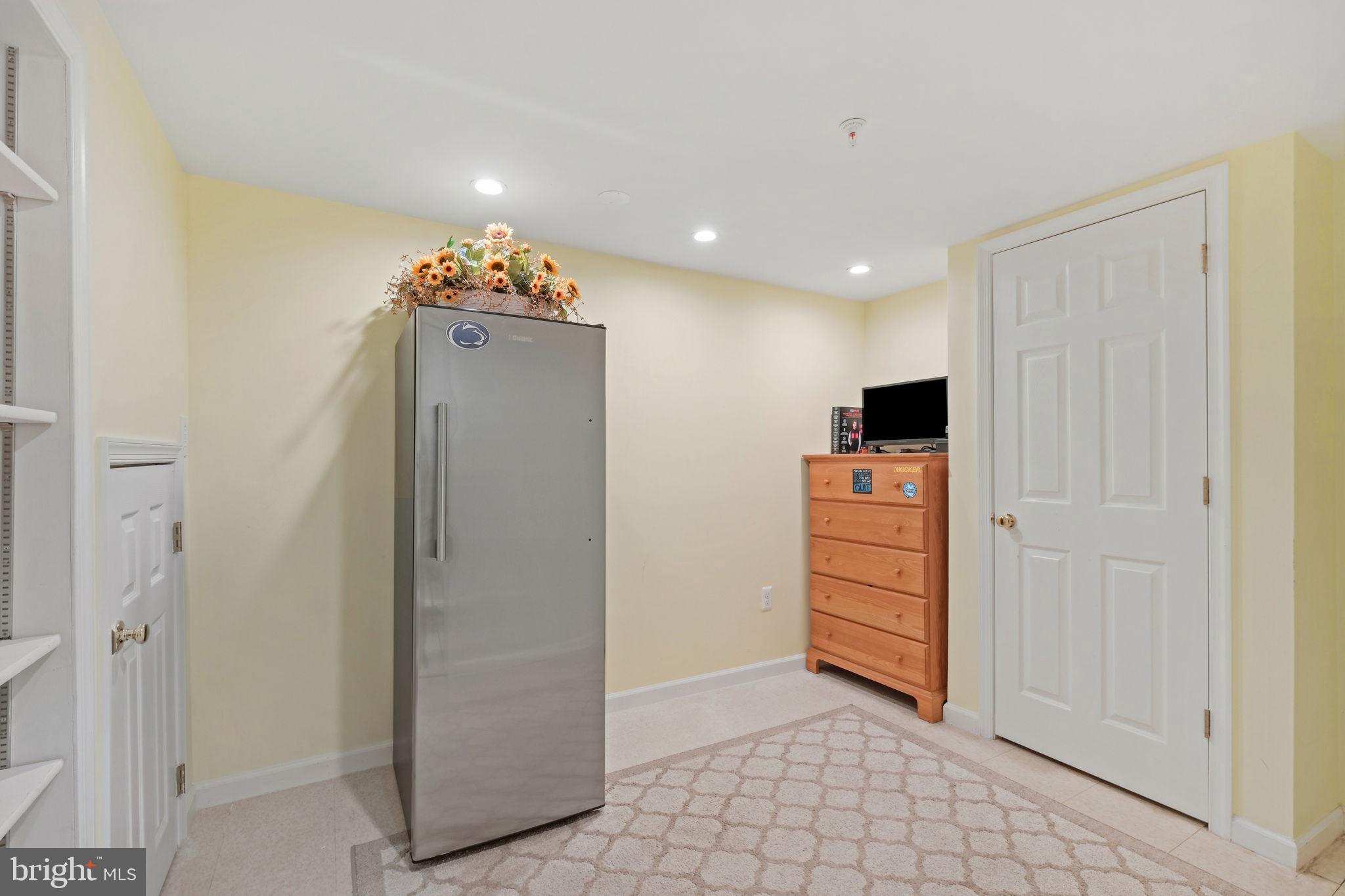 220 Thaxton Street Gaithersburg, MD 20878 - Photo 29 of 61 a view of a hallway with storage and utility room