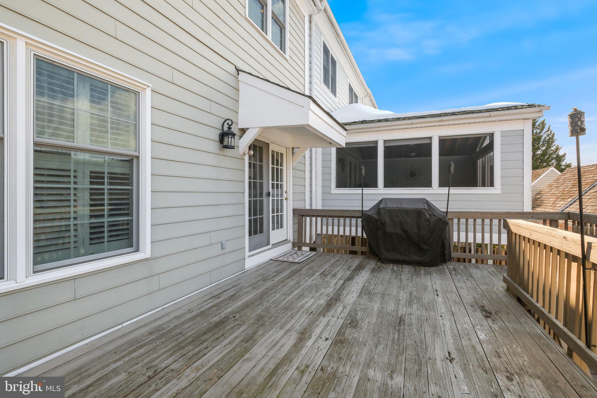 220 Thaxton Street Gaithersburg, MD 20878 - Photo 32 of 61 a view of a house with a large window and wooden floor