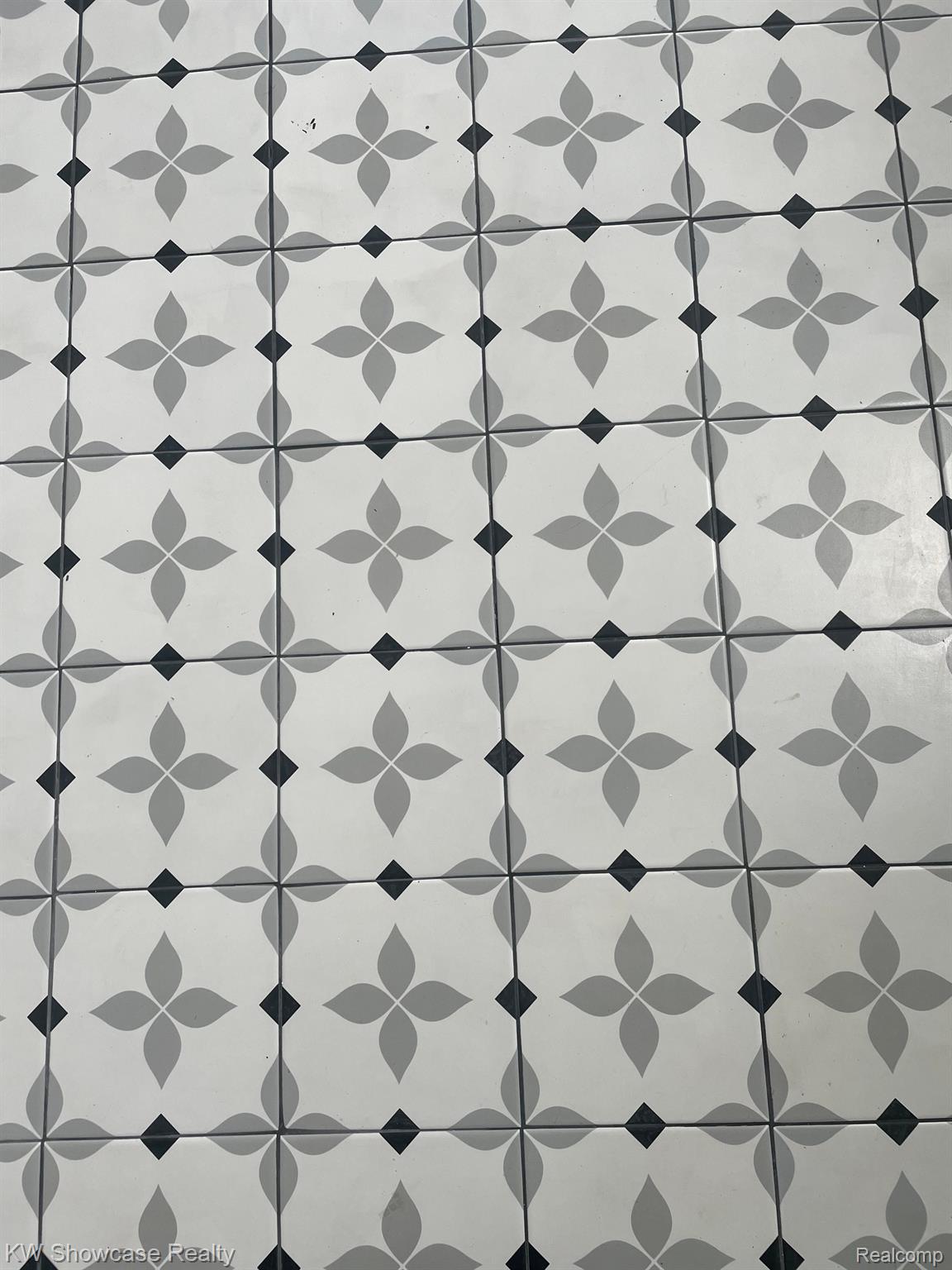 151 East Ruggles Highland, MI 48357 - Photo 32 of 36 Ceramic flooring