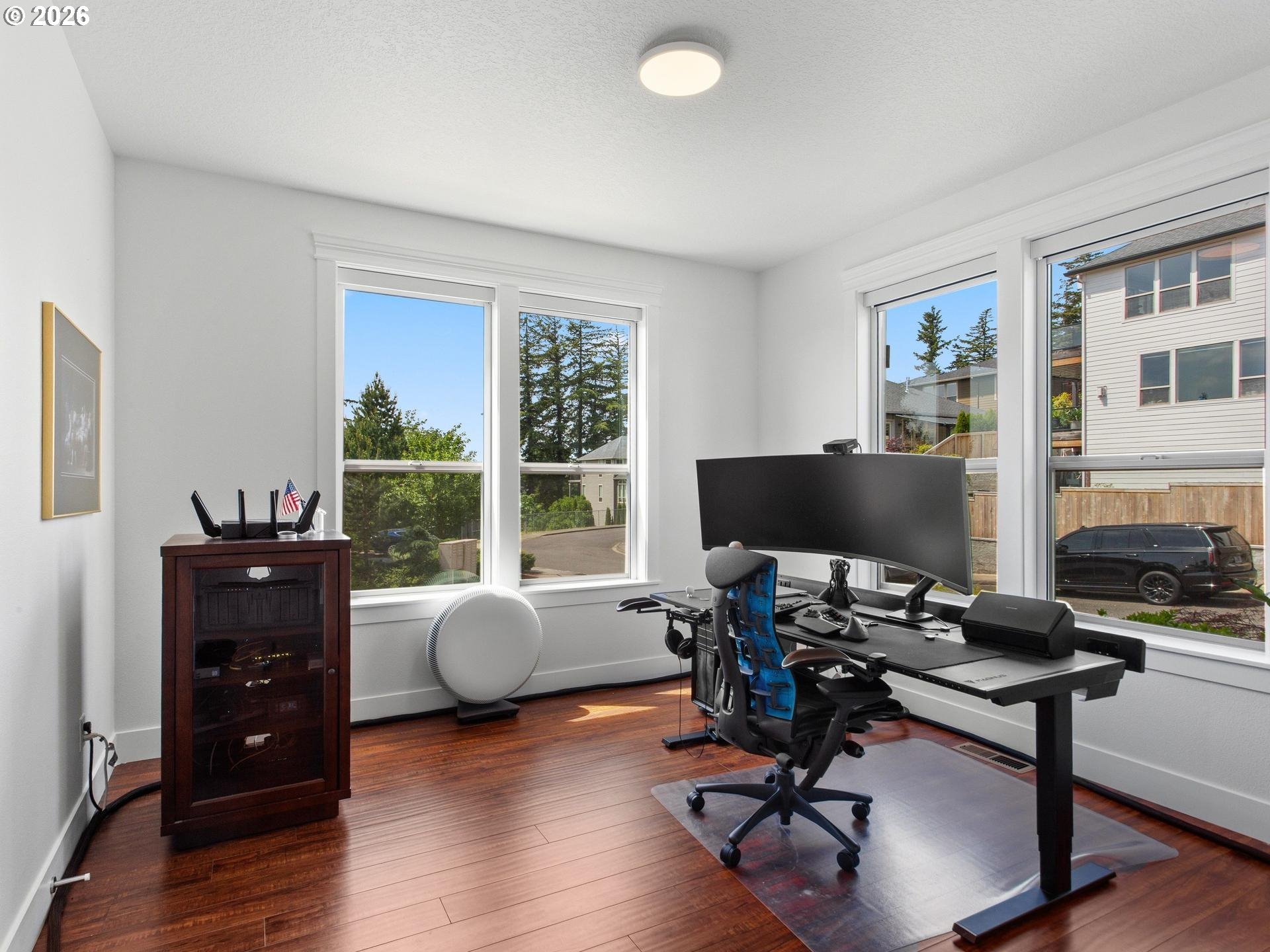 1012 Northwest Goodwin Street Camas, WA 98607 - Photo 5 of 44 a view of a workspace with furniture and a window